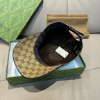 Gucci cap interior with black lining and adjustable strap, showing hang tag