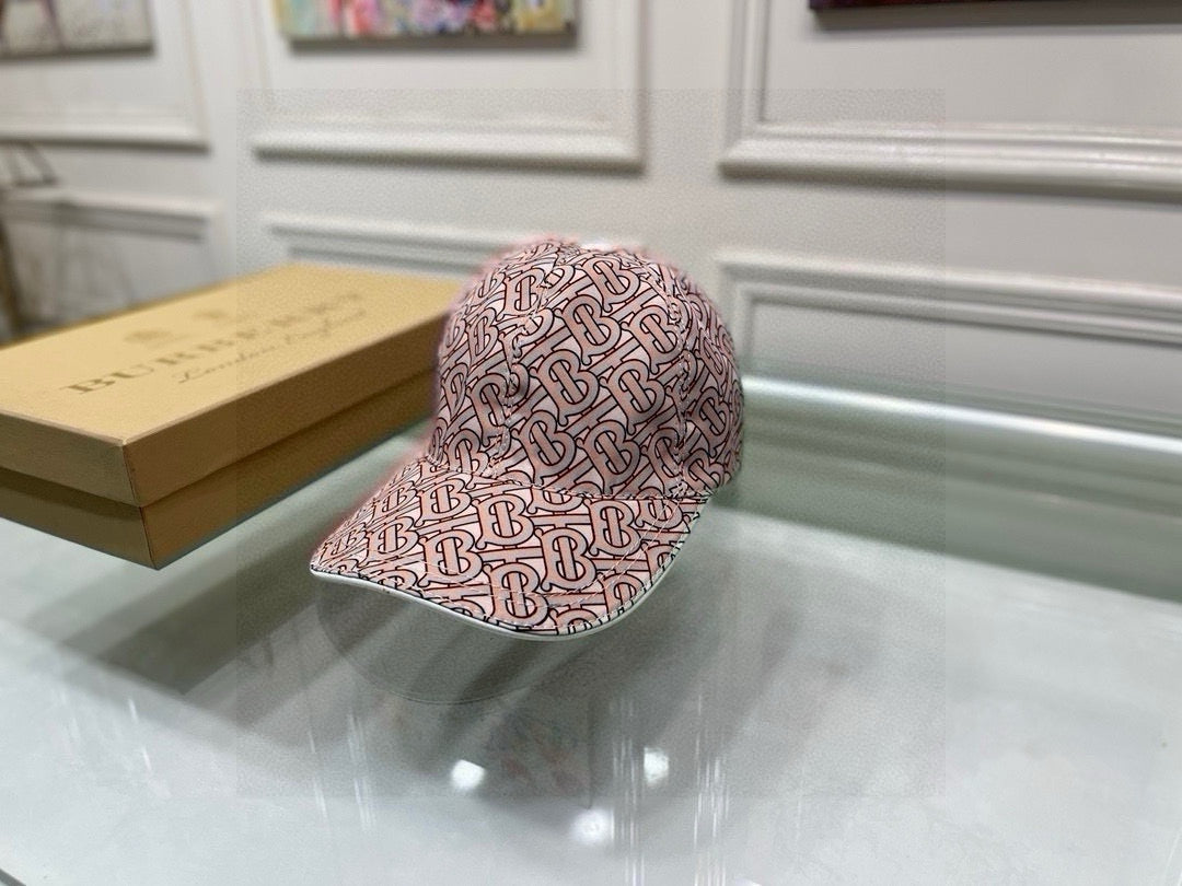 Burberry baseball cap, front view of pink TB monogram print
