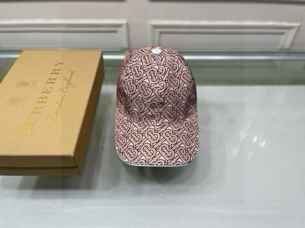 Burberry baseball cap, side view of pink TB monogram print