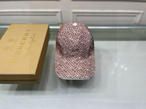 Burberry baseball cap, side view of pink TB monogram print
