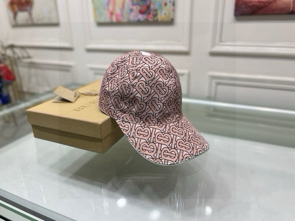 Burberry baseball cap, angled view of pink TB monogram print