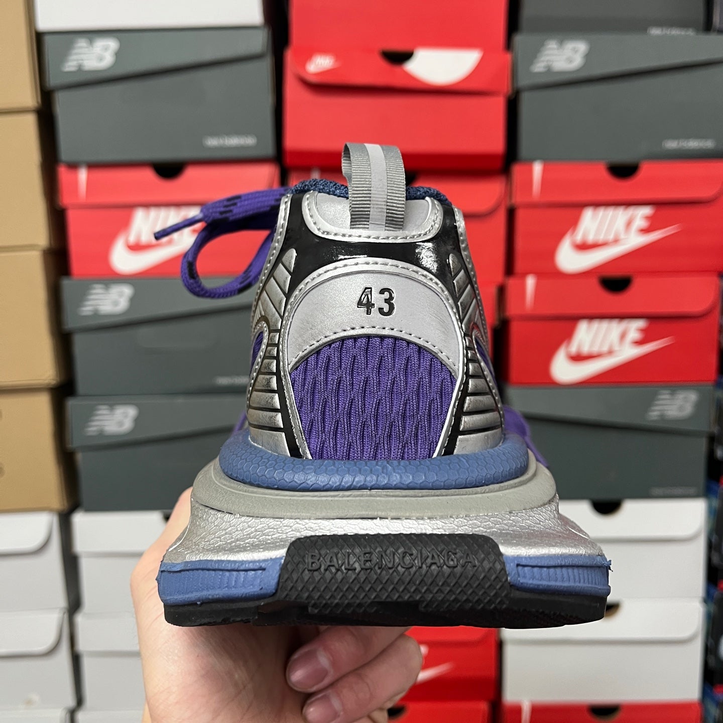 Balenciaga unisex sneakers back view with purple top and gray sole, size mark on heel