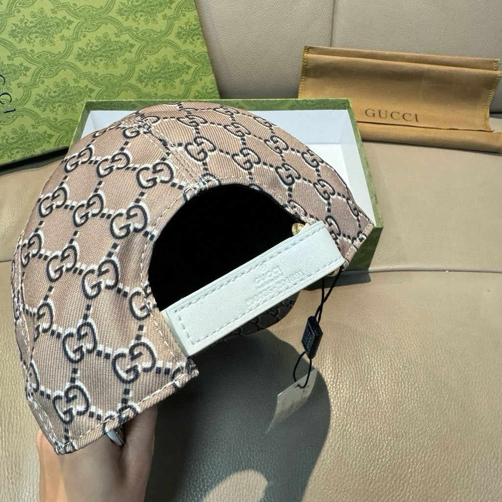 Gucci baseball cap with beige GG monogram and black-lined interior with white strap patch