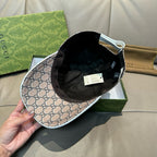 Gucci baseball cap interior view showing black lining and beige GG monogram exterior