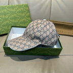 Gucci baseball cap with beige GG monogram print, curved brim and side profile on box