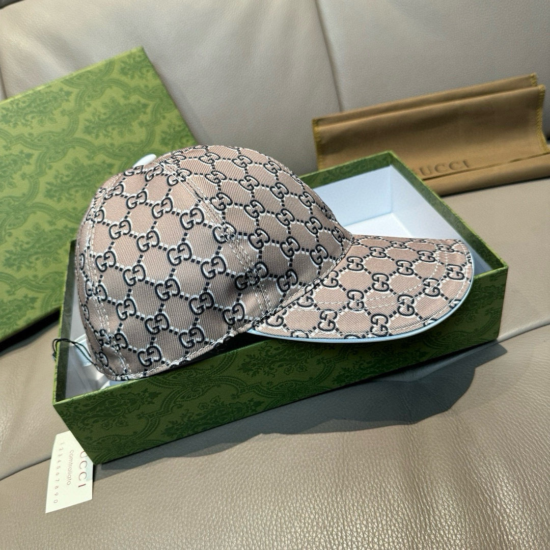Gucci baseball cap with beige GG monogram print and curved brim, angled view