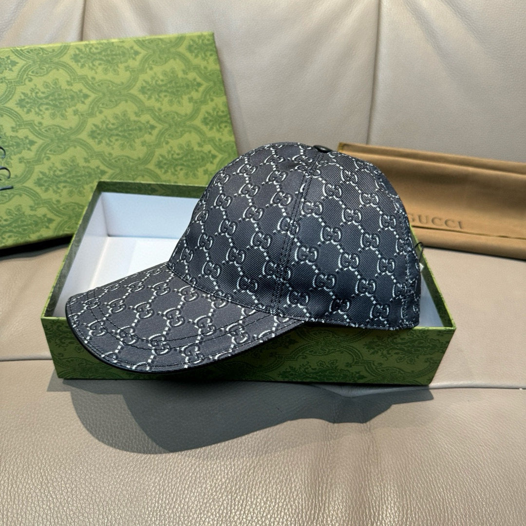 Gucci baseball cap in dark navy with allover GG monogram pattern, front view