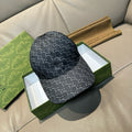 Gucci baseball cap in dark navy with GG monogram pattern and curved brim