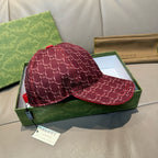 Burgundy GG-pattern baseball cap with adjustable strap and brim