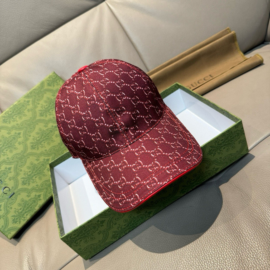 Burgundy Gucci cap with GG jacquard pattern and curved brim