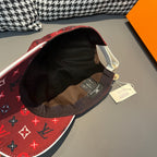 Red Louis Vuitton cap interior view with dark lining and adjustable strap