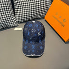 Louis Vuitton navy patterned baseball cap with multicolor monogram motifs and curved brim