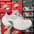 White and pink lace-up sneakers with chunky midsole and textured mesh upper