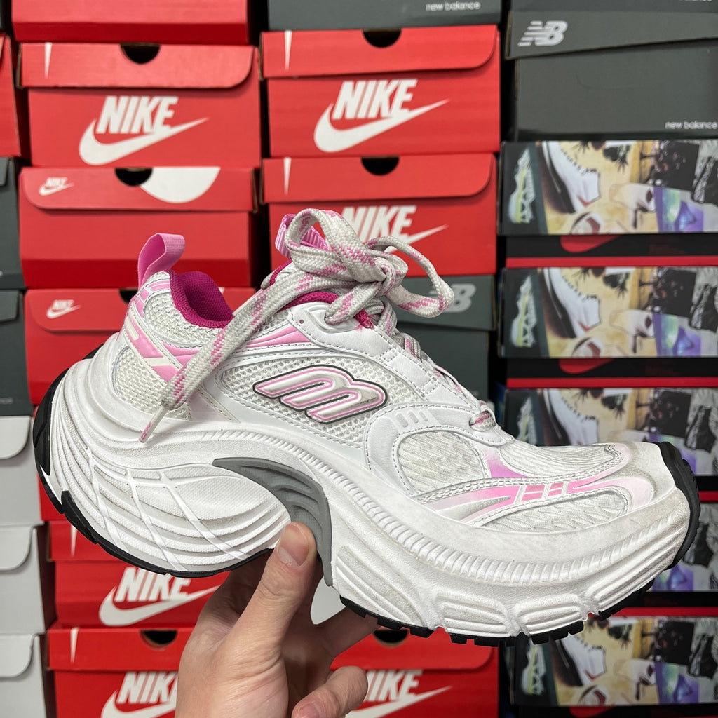 White and pink lace-up sneakers with rounded toe and thick sculpted midsole