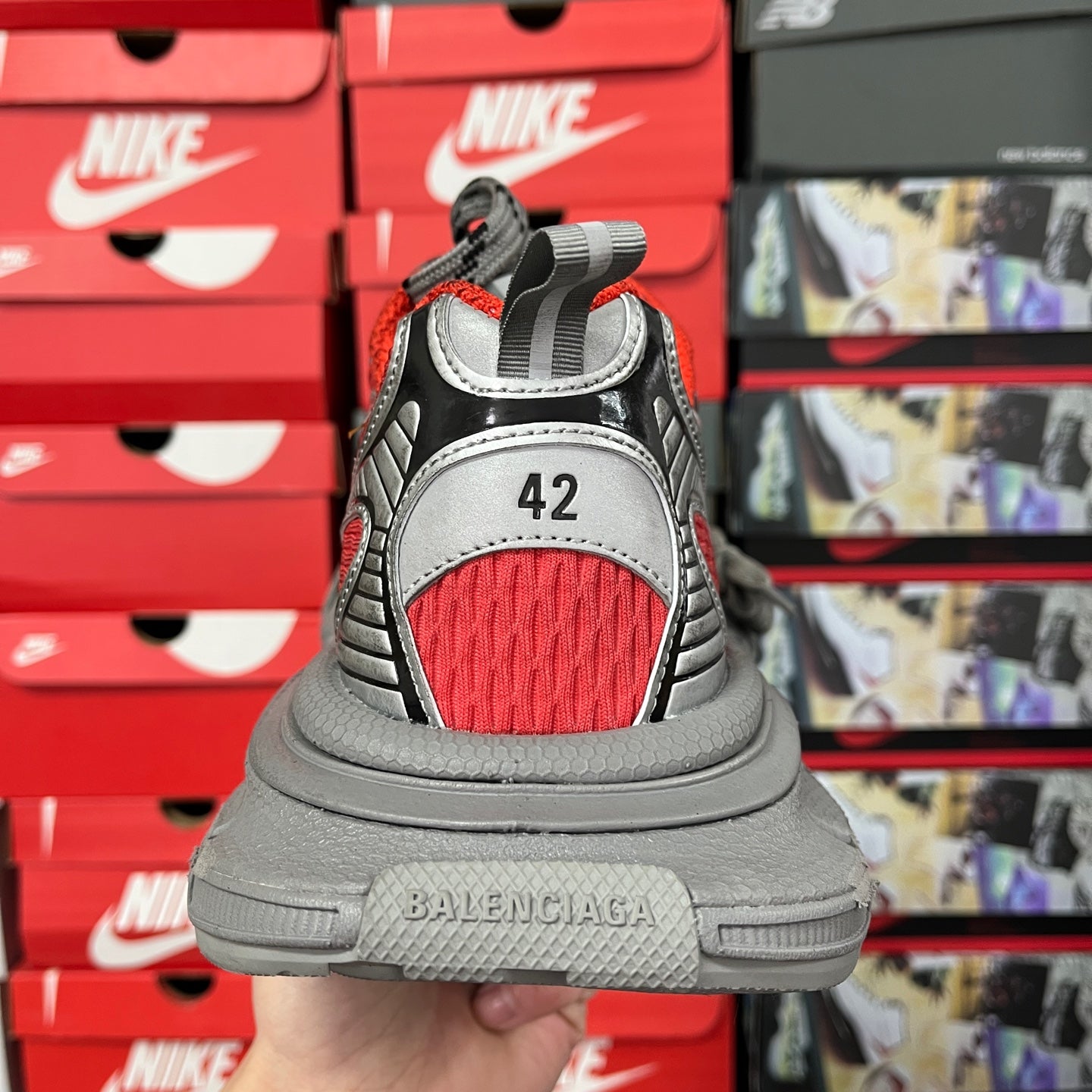 Gray sneaker heel with red mesh backing, size 42 patch, BALENCIAGA sole
