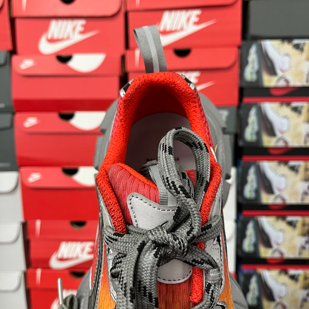 Red-lined collar sneaker with gray laces and textured gray heel panel