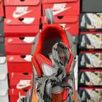 Red-lined collar sneaker with gray laces and textured gray heel panel