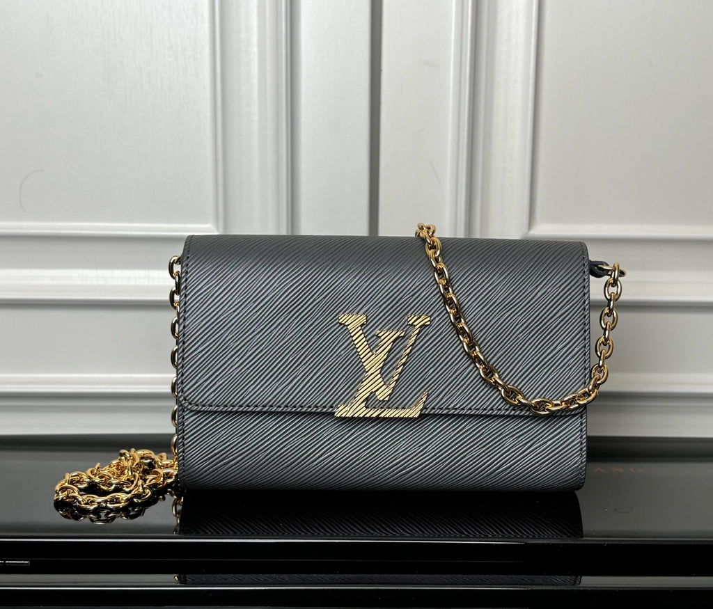 Louis Vuitton crossbody bag in dark blue-gray with gold LV monogram and chain strap
