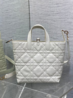 Dior quilted white tote bag with top handle and adjustable crossbody strap