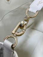 Dior white bag strap with gold swivel clasp and hardware detail