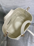 Dior quilted white tote bag open top with cream lining and side handles