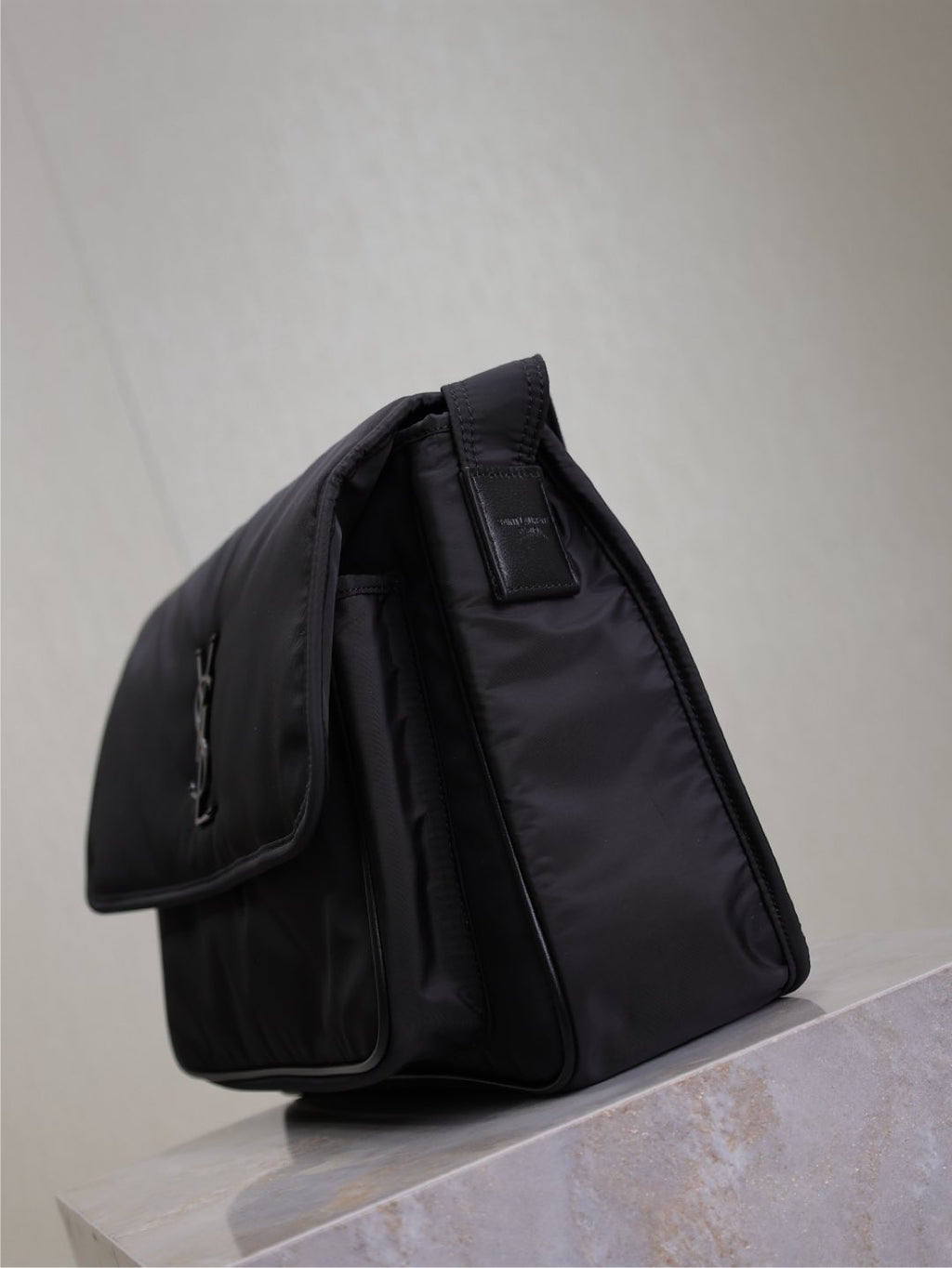 YSL bag with top handle and side pockets, dark nylon, structured padded shape