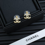 Chanel CC drop earrings with gold-tone hardware and clear stones in box