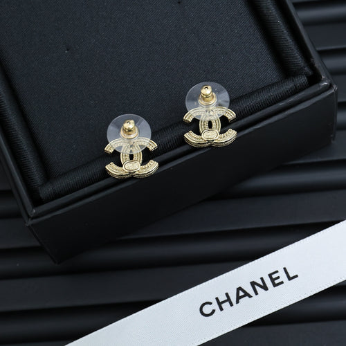Chanel CC drop earrings with gold-tone hardware and clear stones in box