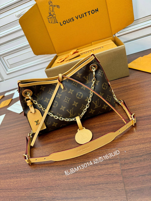 Louis Vuitton monogram mini shoulder bag with chain strap and tan leather trim