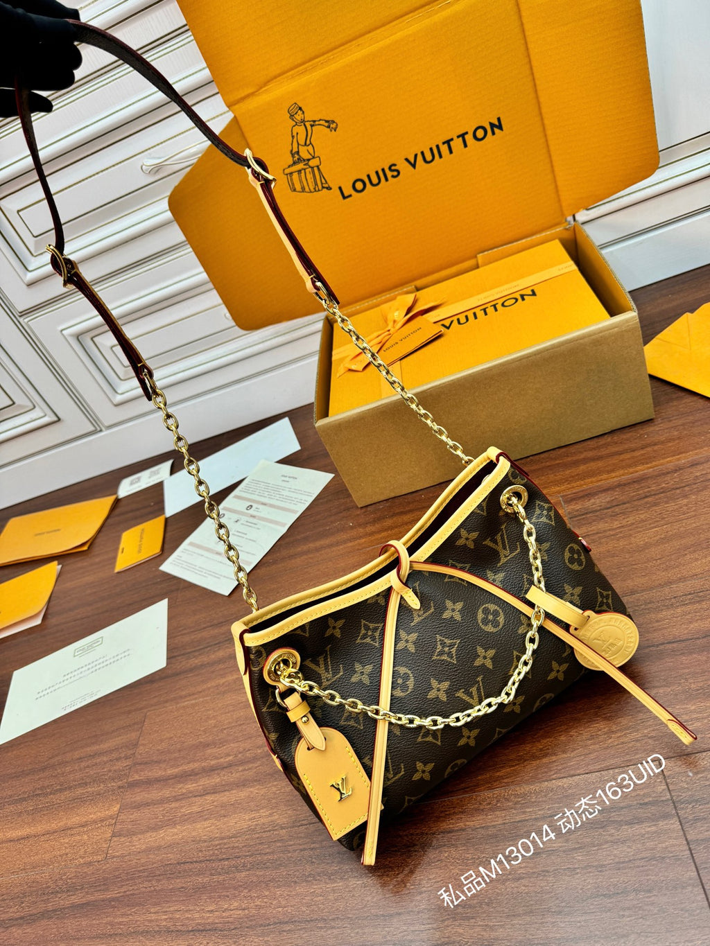 Louis Vuitton monogram mini shoulder bag with long chain strap and gold key charm