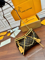 Louis Vuitton monogram mini shoulder bag with long chain strap and gold key charm