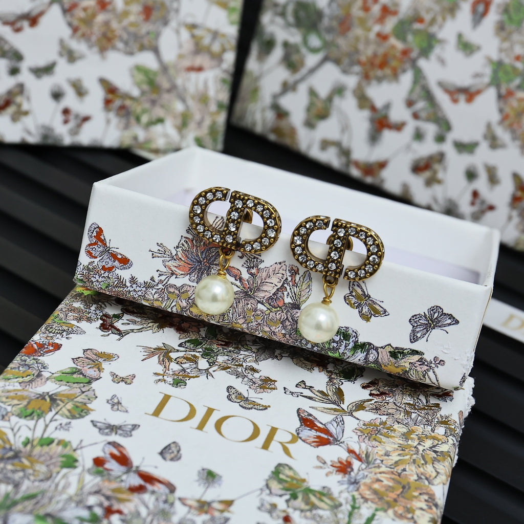 Dior logo stud earrings with crystal halo and white pearl drop