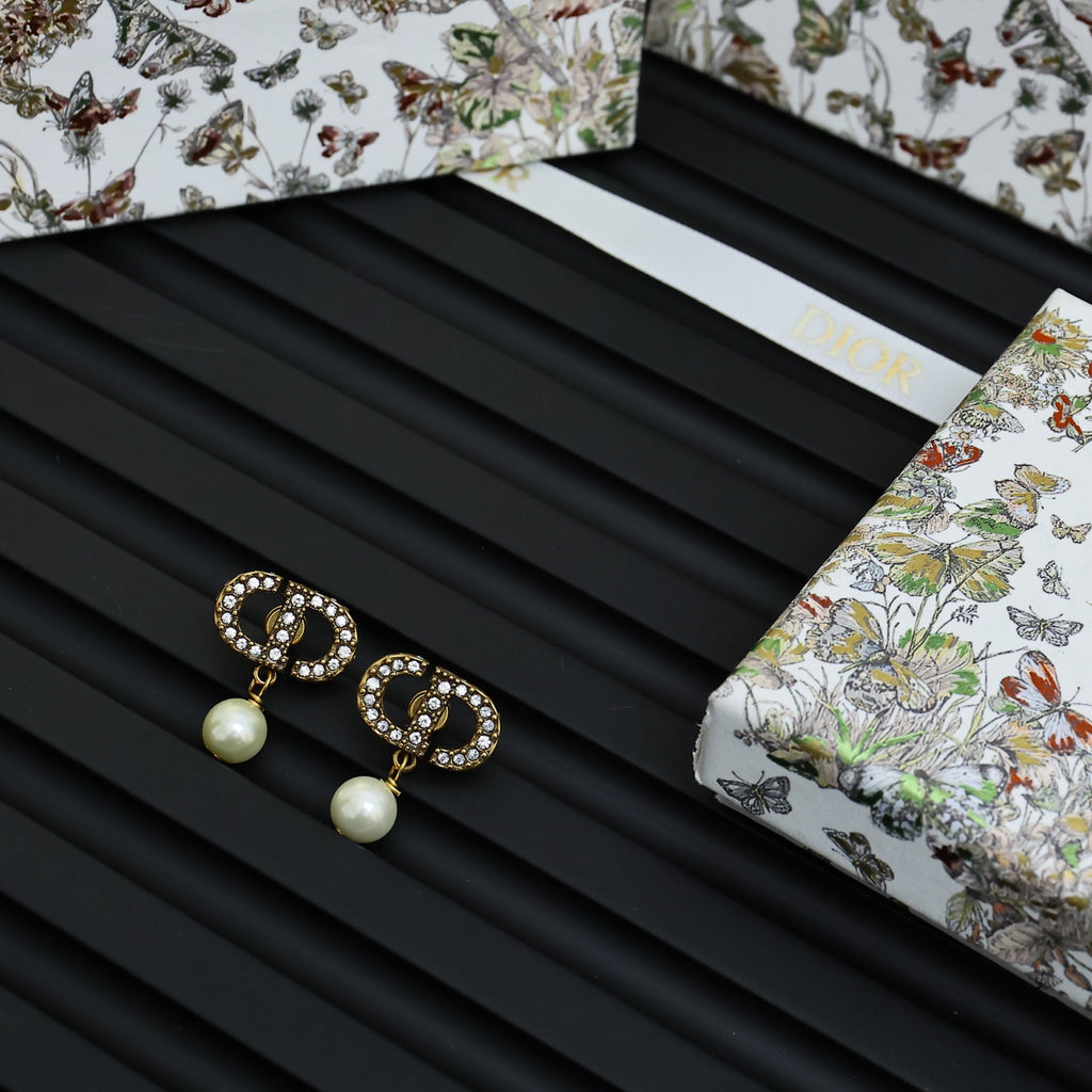 Dior logo drop earrings with crystal trim and white pearl drops