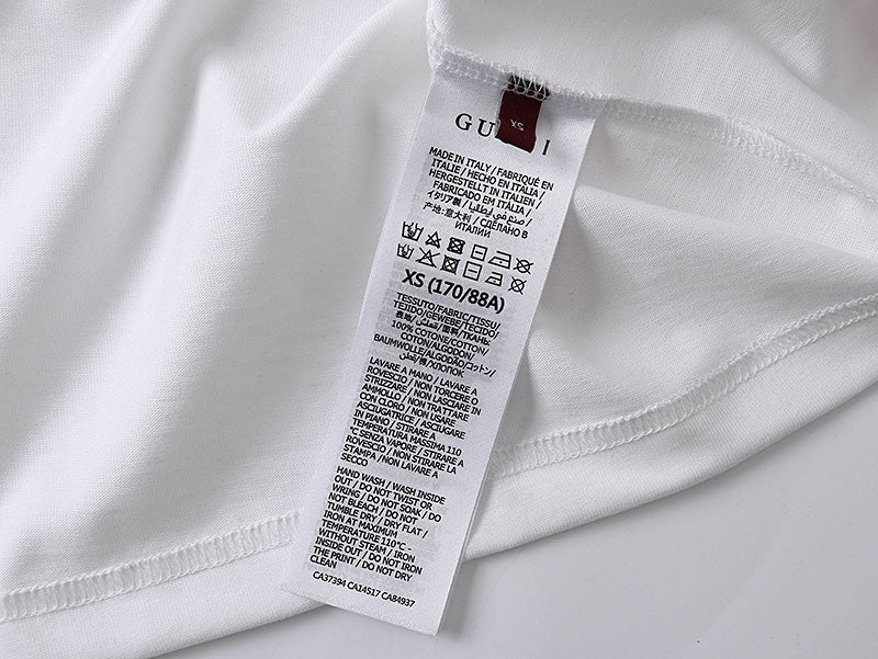 White T-shirt with size and care label at inner neckline