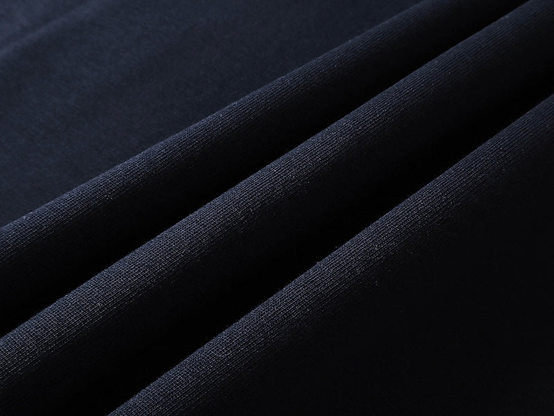 Gucci short-sleeve T-shirt fabric close-up, dark navy knit texture