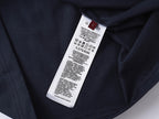 Gucci short-sleeve T-shirt interior neck tag on dark navy fabric