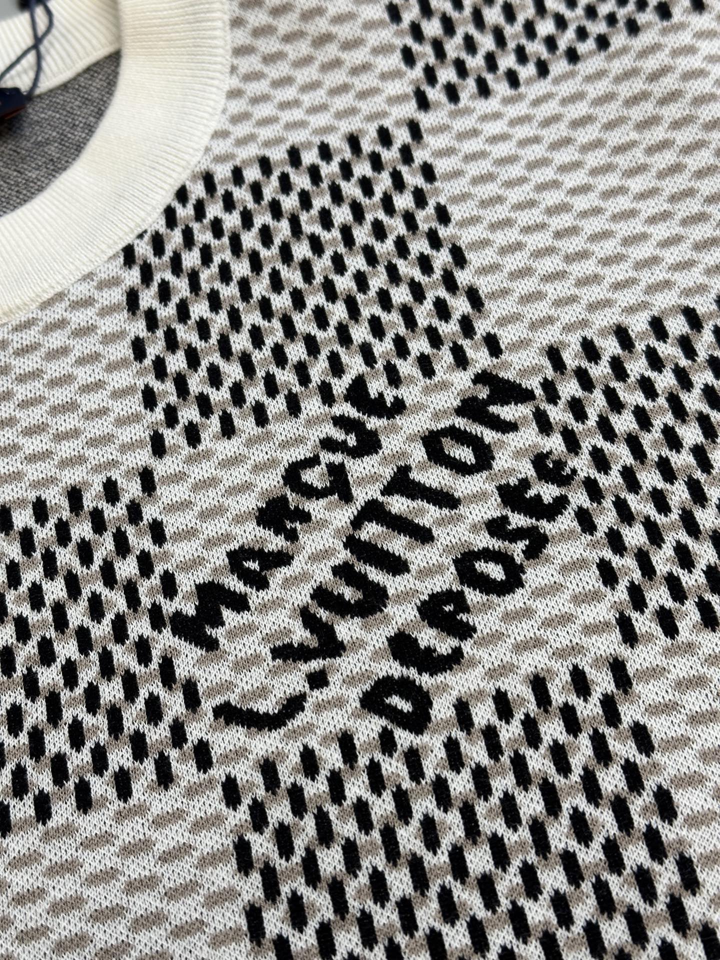 Louis Vuitton check-pattern knit T-shirt with black-and-white logo text on chest