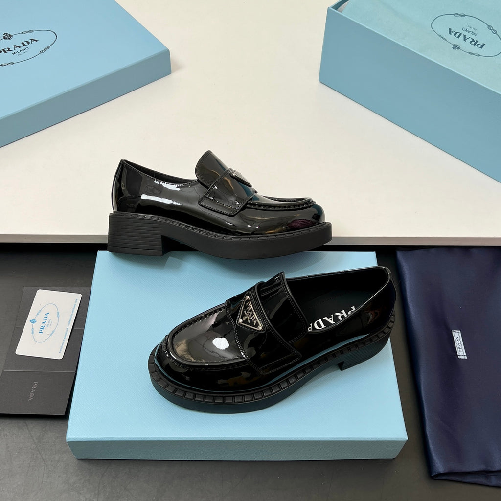 Prada unisex patent loafers, black, slip-on style with chunky platform sole