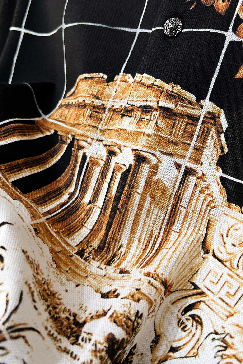 Versace short-sleeve shirt print close-up, gold-and-cream statue illustration on black