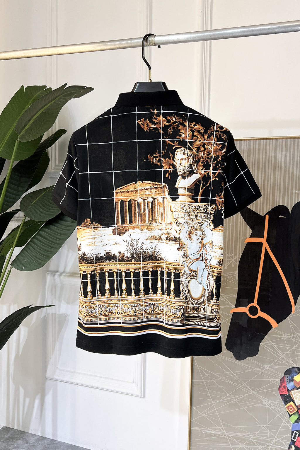 Versace short-sleeve shirt on hanger, black with white grid lines and ornate gold print