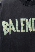 Balenciaga black T-shirt chest with green and yellow BALENCIAGA print