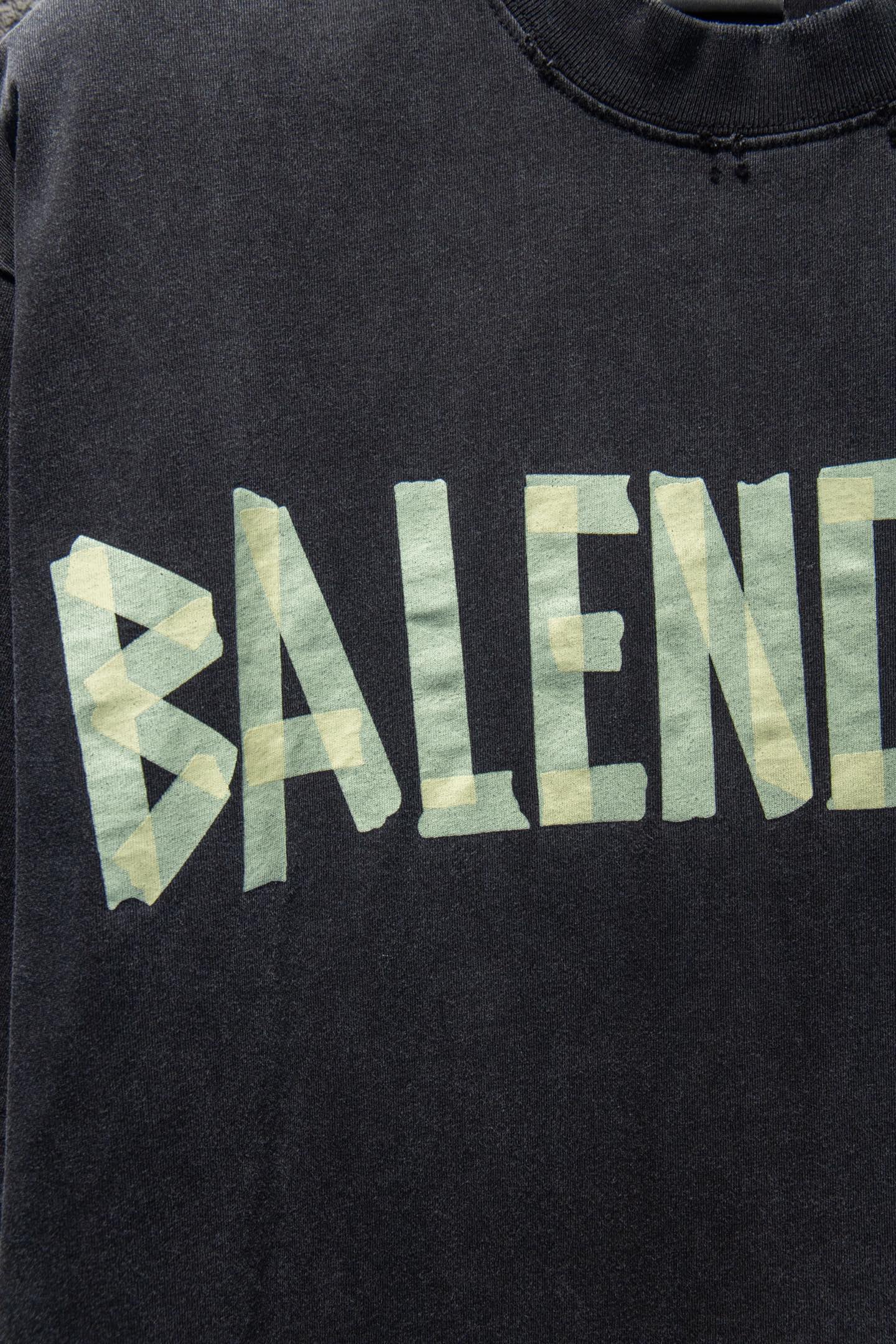 Balenciaga black T-shirt chest with green and yellow BALENCIAGA print