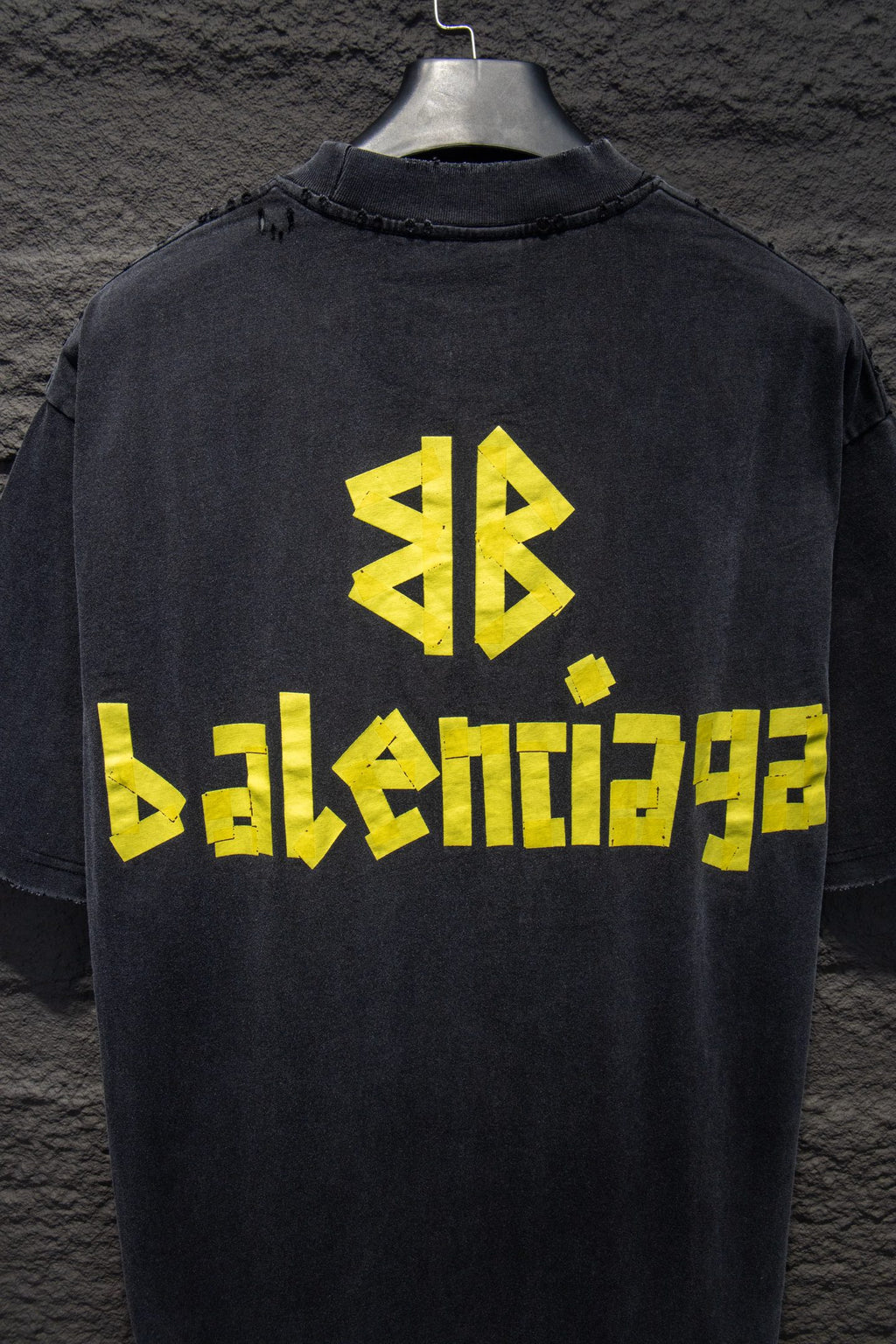 Balenciaga black T-shirt with back yellow logo graphic
