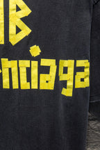 Balenciaga black T-shirt sleeve with yellow geometric logo print