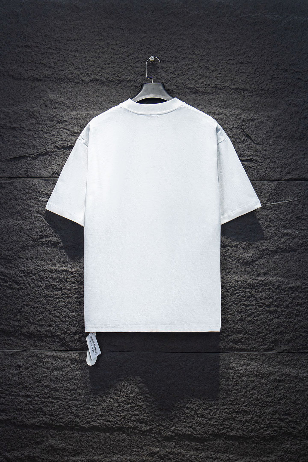 White short-sleeve T-shirt, back view, with small hang tag