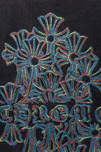 Black T-shirt close-up of large floral graphic embroidery