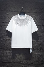 White short-sleeve T-shirt with beaded starburst and rhinestone cross detail