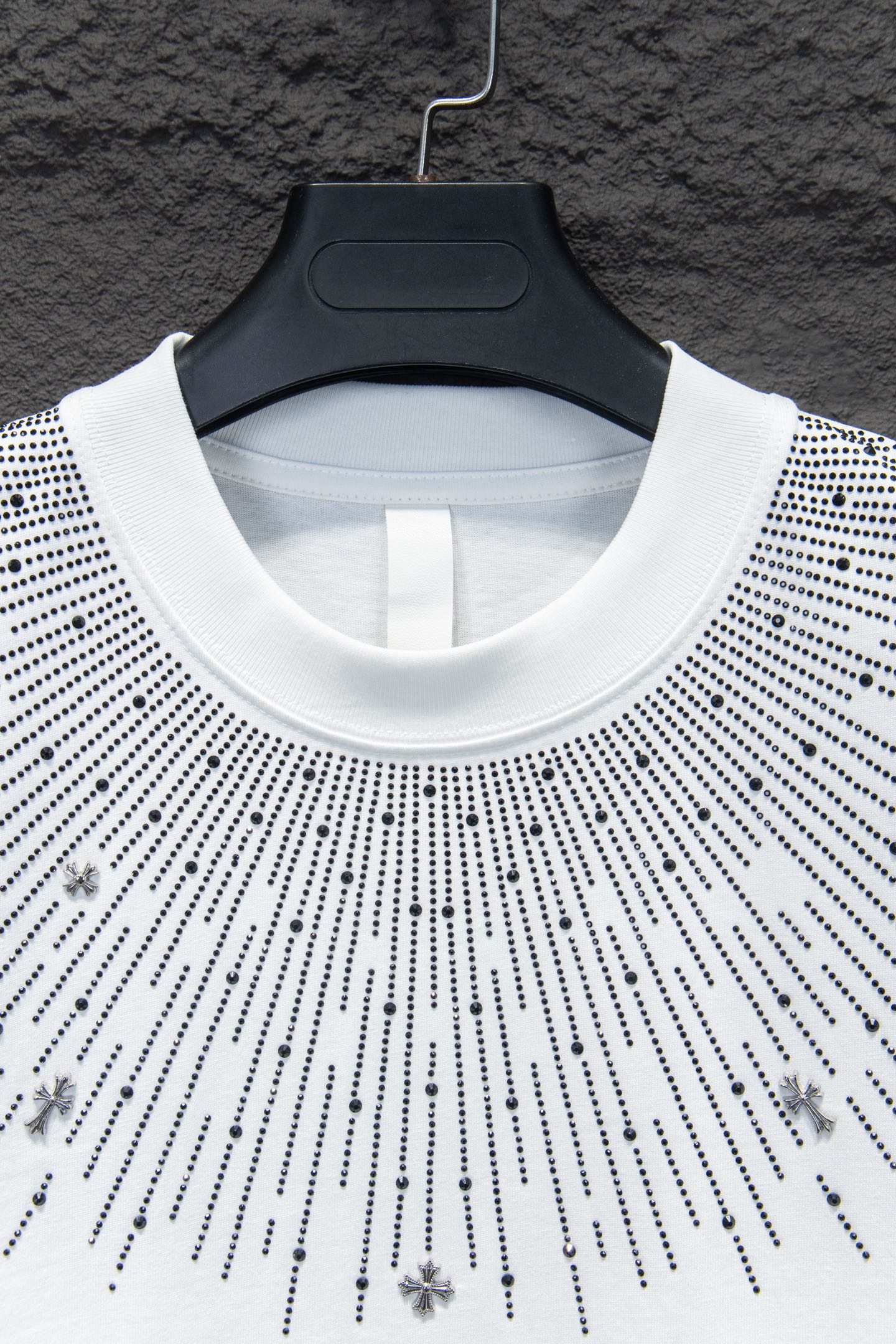 Crew-neck T-shirt with studded starburst embellishment across the chest