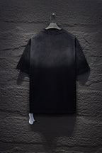 Chrome short-sleeve top, black knit with small stud accents on back