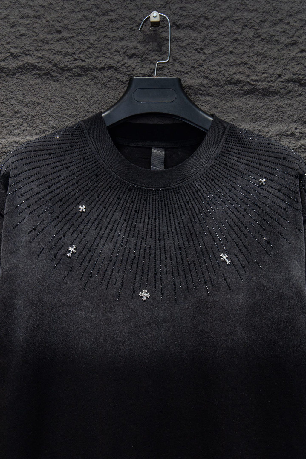 Chrome short-sleeve top, black knit with crystal-like star cross studs